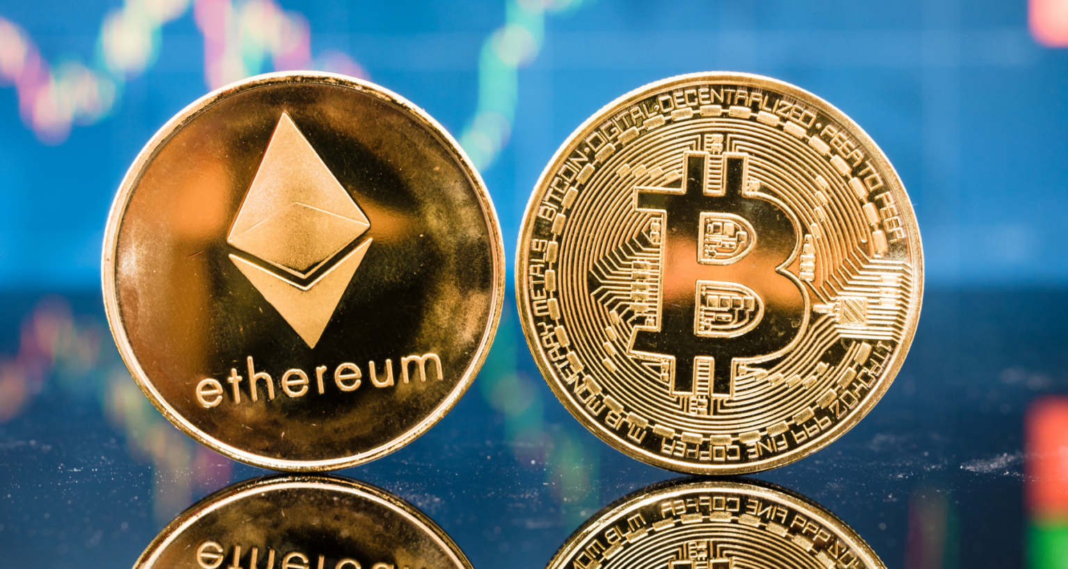 Bitcoin ed Ethereum scendono, ma i volumi tengono